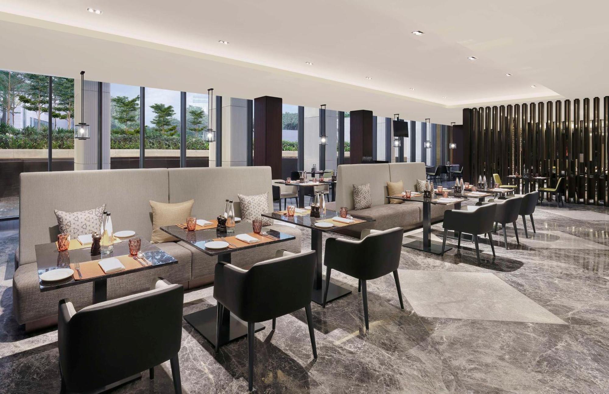 Hilton Bengaluru Embassy Manyata Business Park Hotel Exterior photo