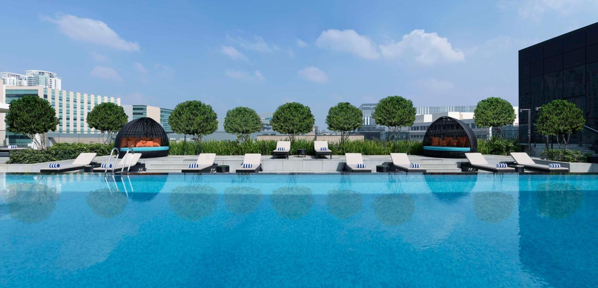 Hilton Bengaluru Embassy Manyata Business Park Hotel Exterior photo