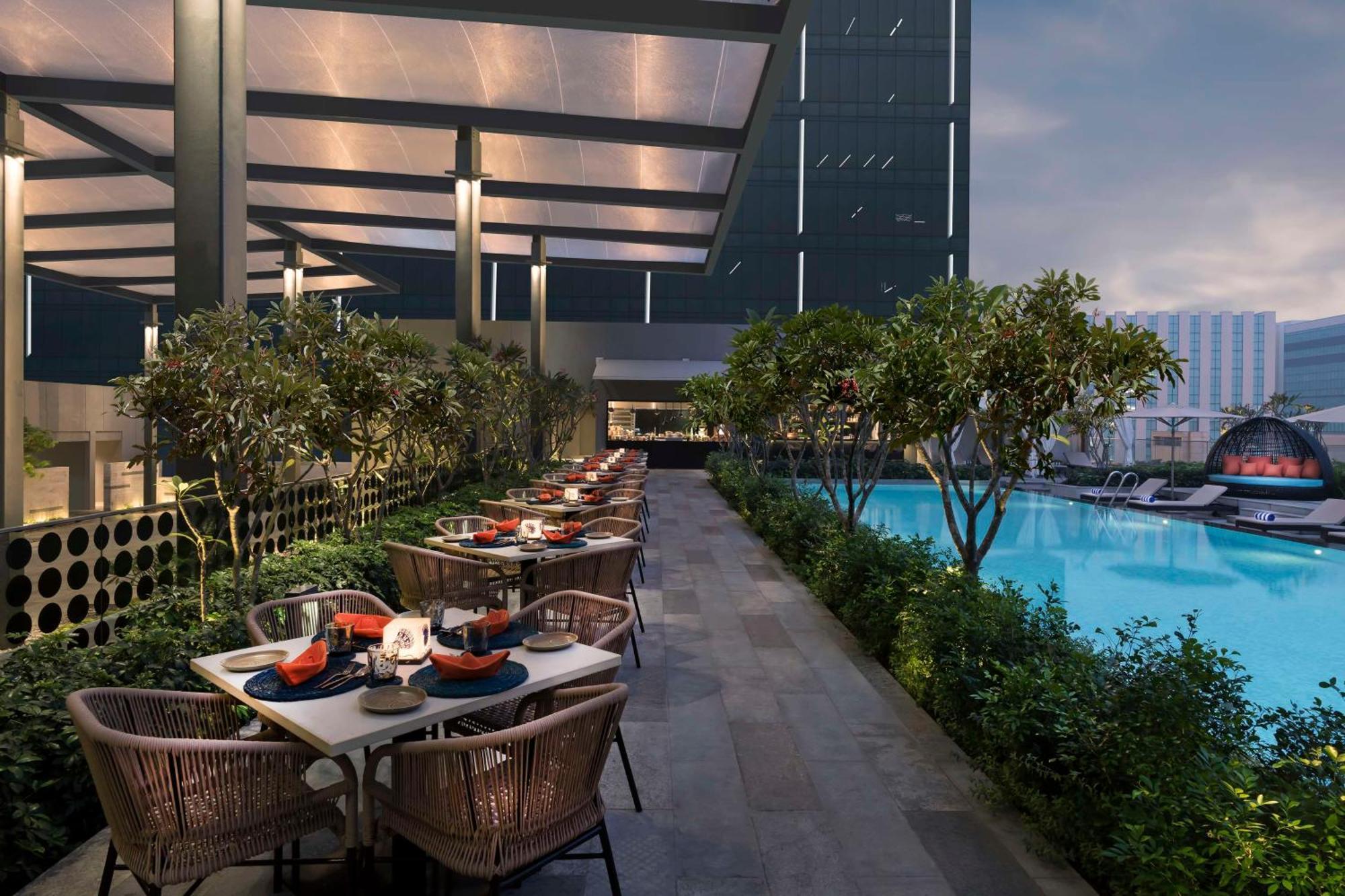 Hilton Bengaluru Embassy Manyata Business Park Hotel Exterior photo